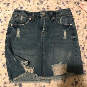 Distressed denim mini skirt
